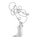 A silver-toned necklace featuring a detailed cowboy boot pendant on a delicate beaded chain, displayed against a plain white background with a price label of $574 below.