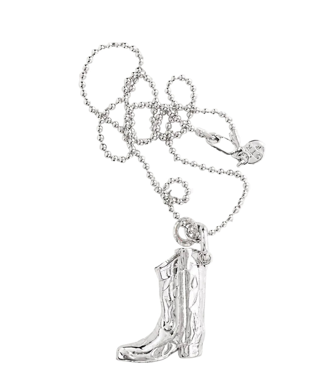 A silver-toned necklace featuring a detailed cowboy boot pendant on a delicate beaded chain, displayed against a plain white background with a price label of $574 below.